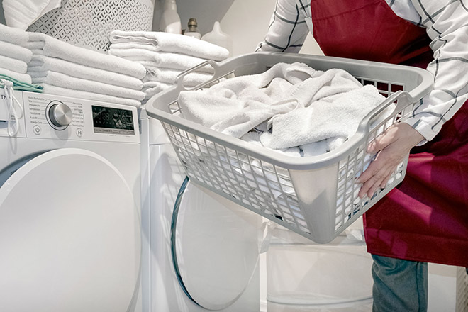 wash dry towel worker laundry washing machine hotel